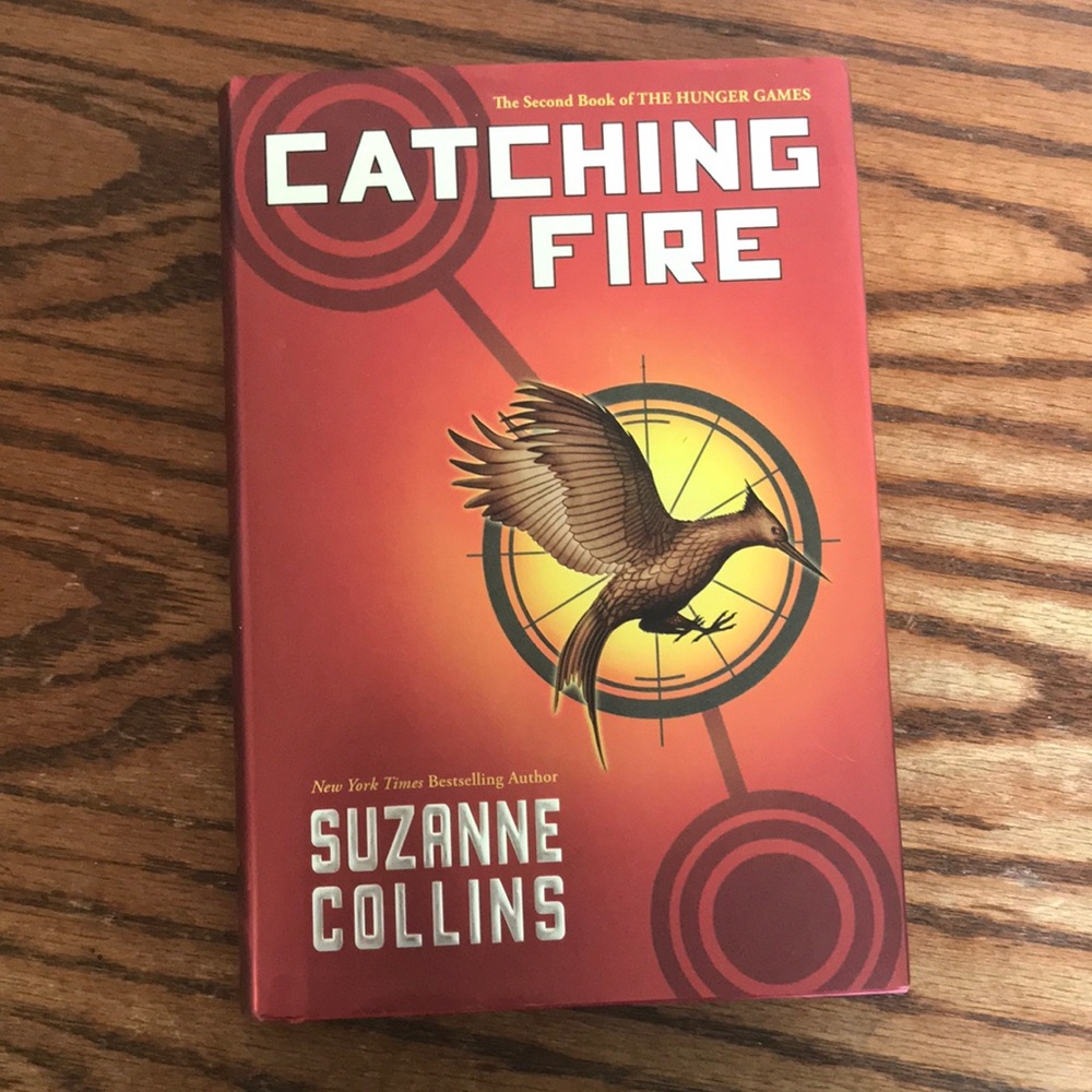 Catching fire by Susanna collins, hardcover like new